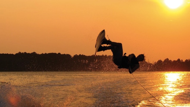 wake board rider in hilton head sunset boat trip