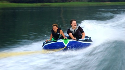 Tubing on a family boat trip