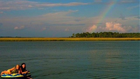 Tubing in Hilton Head with rainbow in background